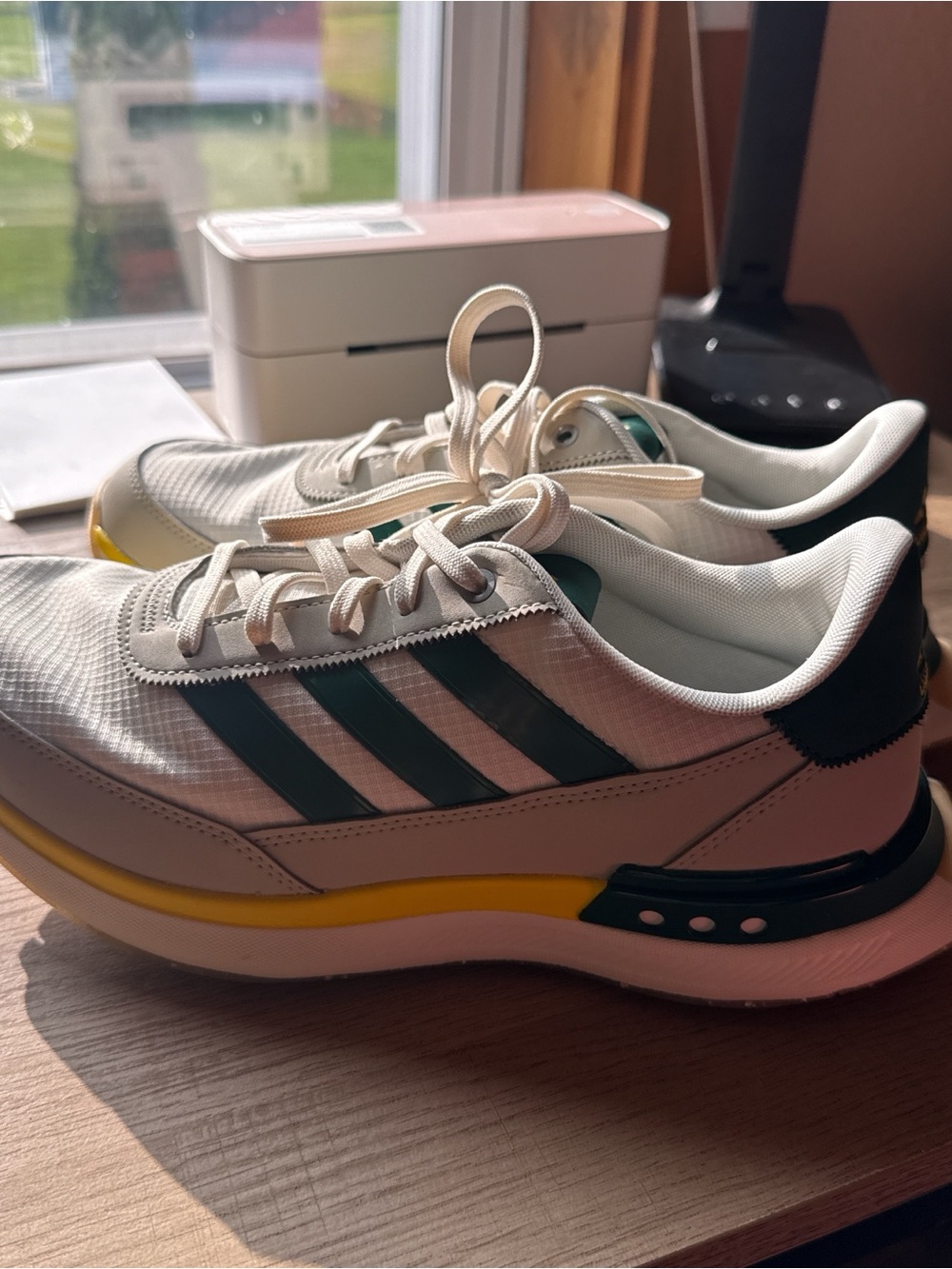 Adidas White Sneakers with Green Stripes and Yellow Accents